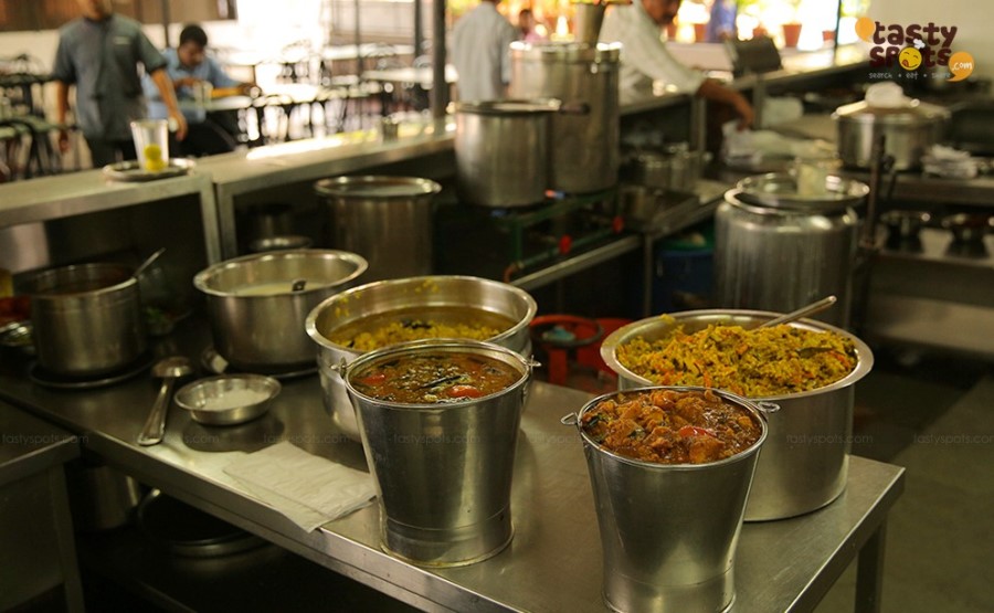 Fresh curries and biriyani being prepared in the kitchen
